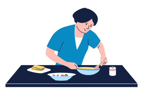 A Woman is Cooking Food on a Table Graphics and Illustrations